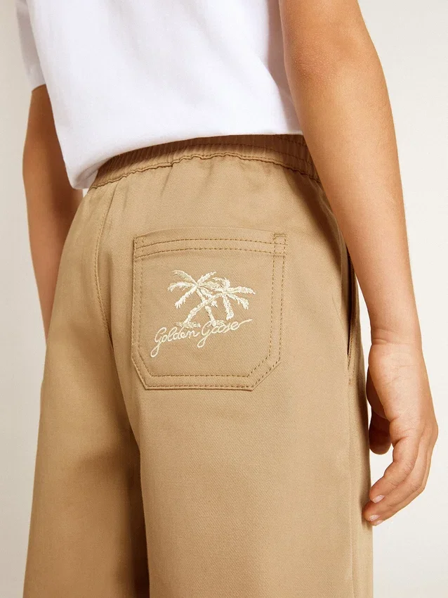 Pantalones cortos de algodón beige para niños