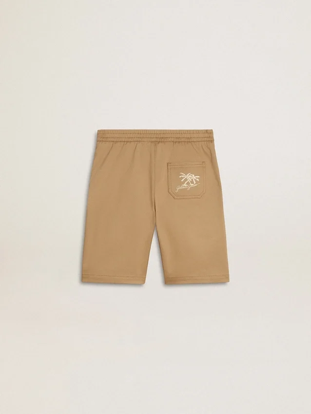 Pantalones cortos de algodón beige para niños