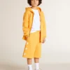Pantalones cortos de color amarillo mostaza para niños