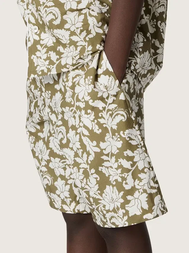 Pantalones cortos de lona de algodón para niños de la colección Journey con estampado floral verde y blanco