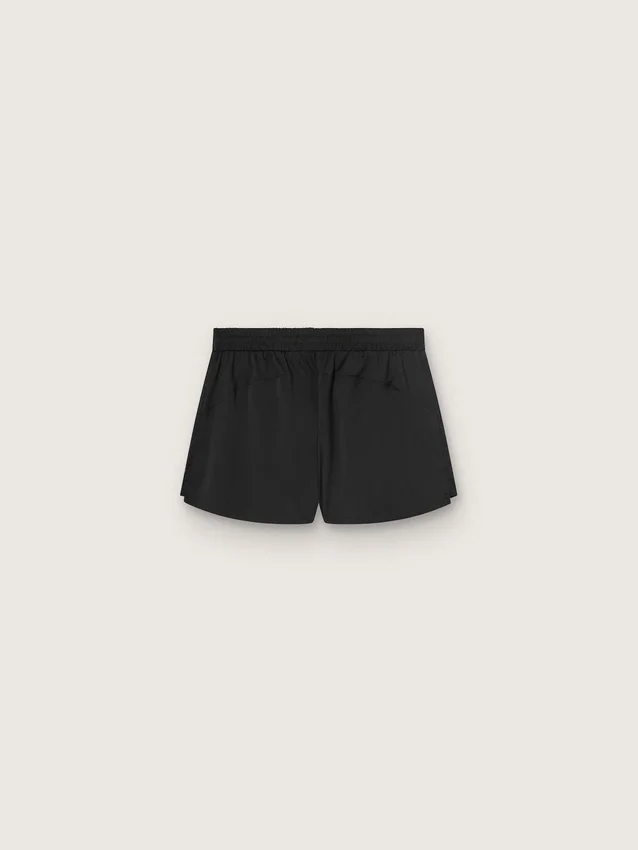 Pantalones cortos deportivos negros de doble capa para mujer