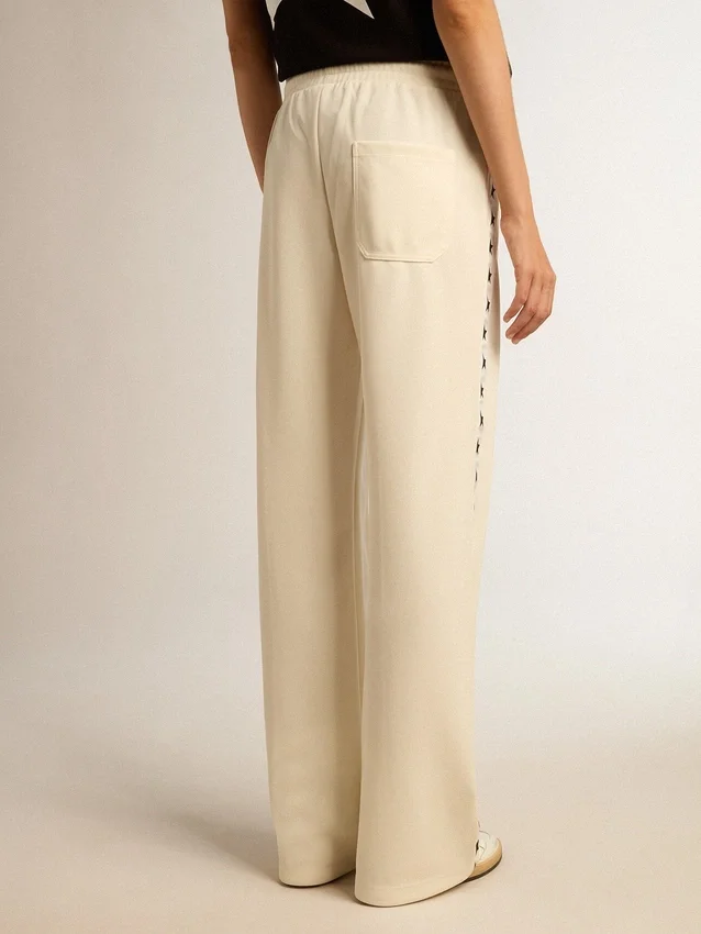 Pantalones de chándal blancos de mujer con estrellas en los laterales