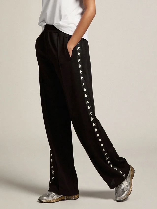 Pantalones de chándal negros de mujer con estrellas blancas en los laterales