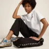 Pantalones de chándal negros de mujer con estrellas blancas en los laterales