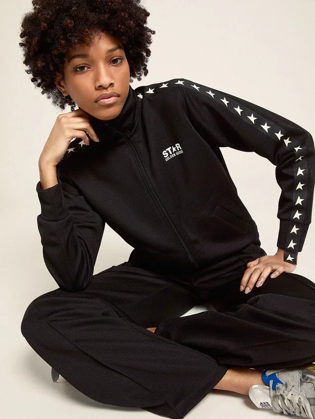 Sudadera negra con cremallera para mujer y estrellas blancas