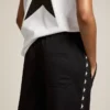Pantalones de chándal negros de mujer con estrellas blancas en los laterales