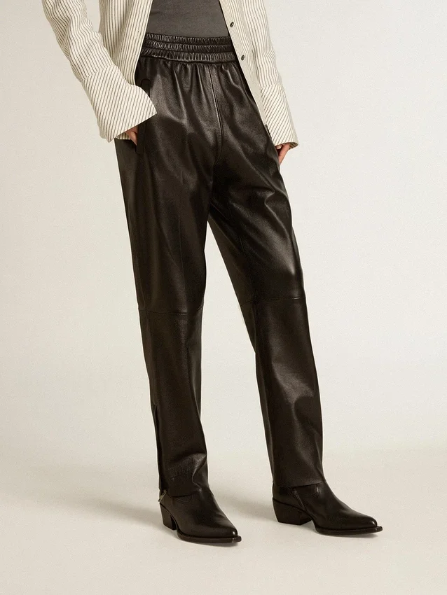 Pantalones de chándal negros de piel napa con cremallera en la parte inferior