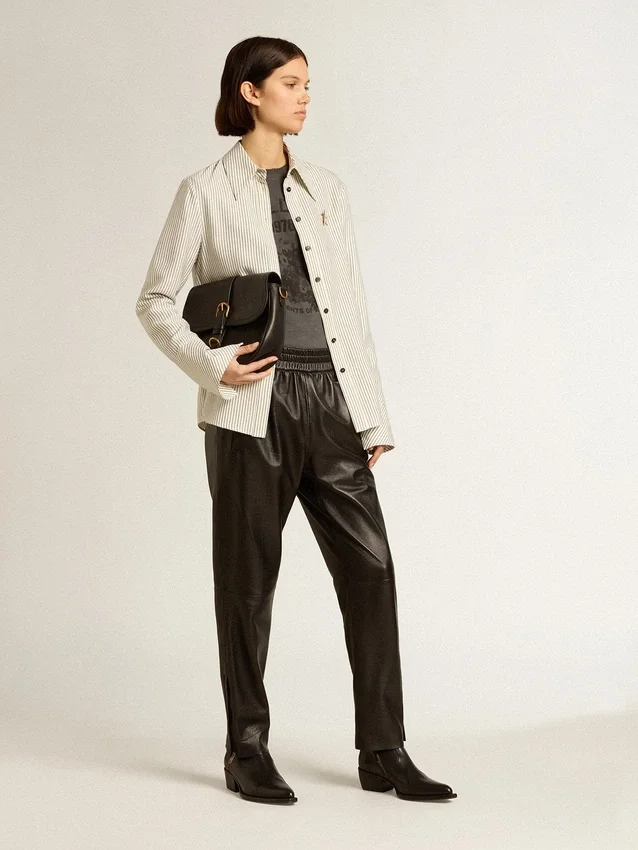 Pantalones de chándal negros de piel napa con cremallera en la parte inferior