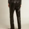 Pantalones de chándal negros de piel napa con cremallera en la parte inferior