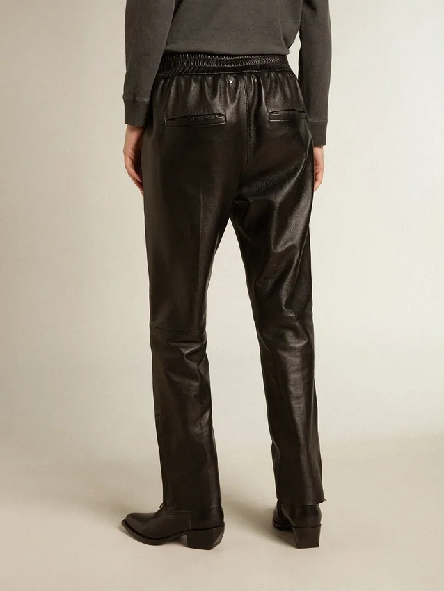 Pantalones de chándal negros de piel napa con cremallera en la parte inferior