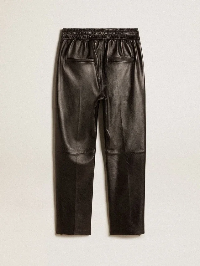 Pantalones de chándal negros de piel napa con cremallera en la parte inferior