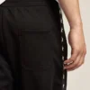 Pantalones de chándal negros para hombre con estrellas blancas en los laterales