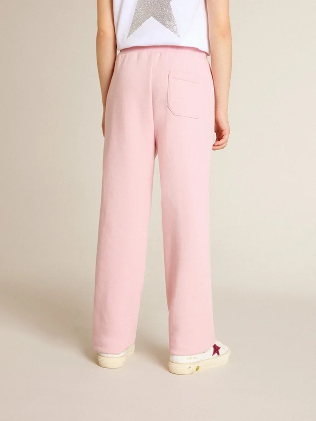 Pantalones de chándal rosas con una estrella brillante en la parte delantera