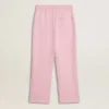Pantalones de chándal rosas con una estrella brillante en la parte delantera