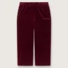 Pantalones de efecto terciopelo burdeos para niñas con bolsillo trasero