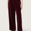 Pantalones de efecto terciopelo burdeos para niñas con bolsillo trasero