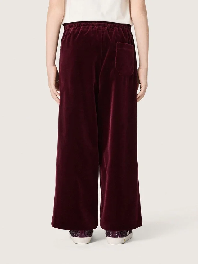 Pantalones de efecto terciopelo burdeos para niñas con bolsillo trasero