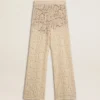 Pantalones de encaje transparente de color crema para mujer