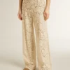 Pantalones de encaje transparente de color crema para mujer