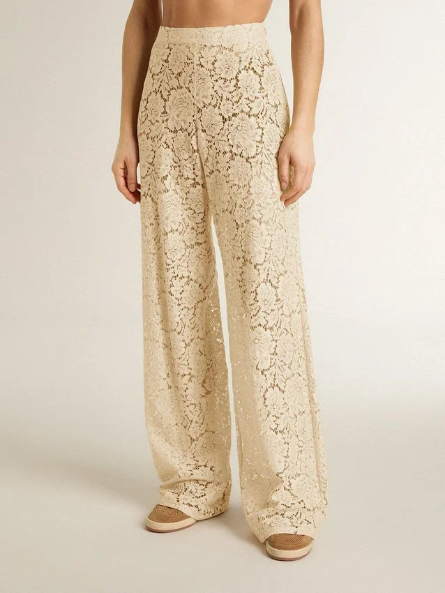 Pantalones de encaje transparente de color crema para mujer
