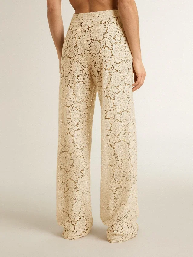 Pantalones de encaje transparente de color crema para mujer