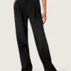 Pantalones de mujer de denim de algodón negro con acabado desgastado