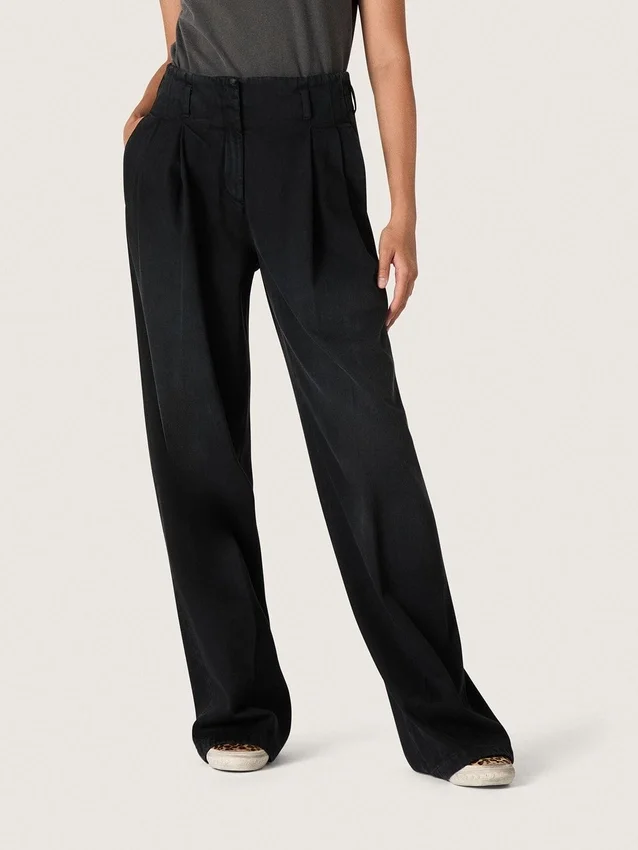 Pantalones de mujer de denim de algodón negro con acabado desgastado