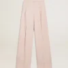 Pantalones de mujer de tejido de lana entallado en color rosa