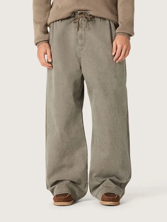 Pantalones unisex de denim gris con cordón y estrella