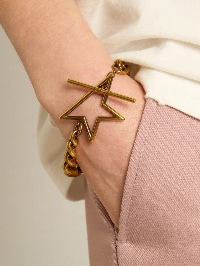 Pulsera de cadena escalonada en oro antiguo con cierre en forma de estrella