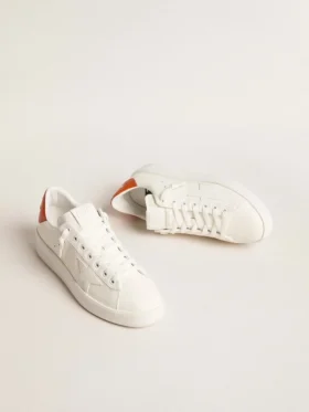 Purestar para mujer con estrella de piel blanca y lengüeta naranja en el talón