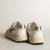 Running Sole de piel blanca y malla con estrella de piel laminada azul