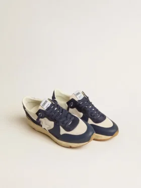 Running Sole en malla color crema y piel azul con una estrella de piel blanca