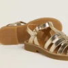 Sandalias Maxime Junior en piel dorada