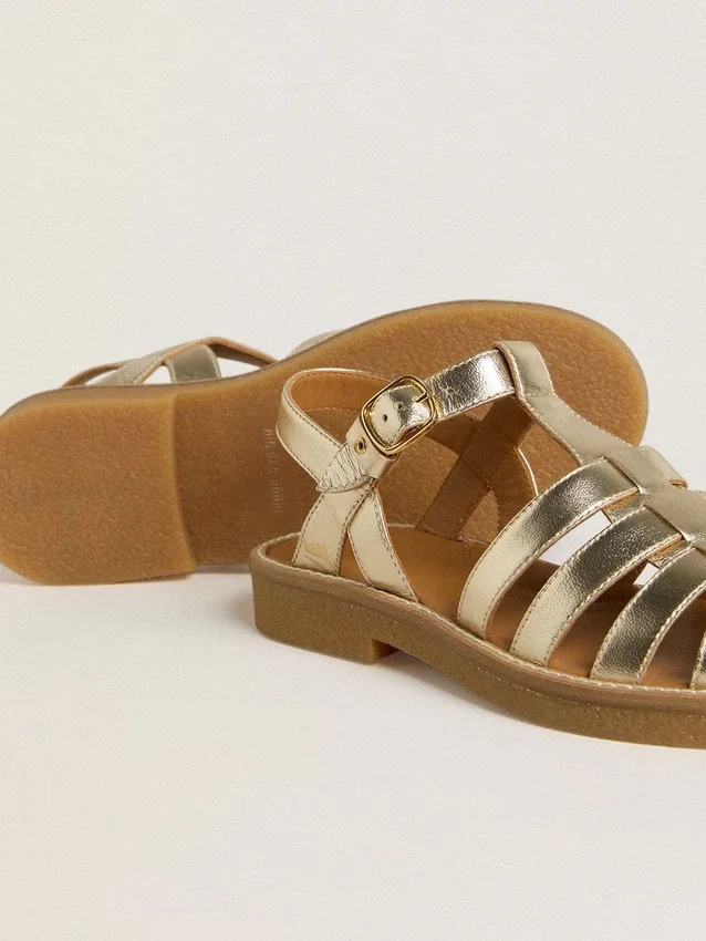 Sandalias Maxime Junior en piel dorada