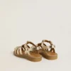 Sandalias Maxime Junior en piel dorada