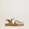 Sandalias Maxime Young en piel dorada