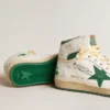 Sky-Star en piel blanca con estrella de piel verde