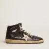 Sky-Star en piel napa negra con estrella de piel blanca