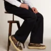 Space-Star para hombre en piel de potro con estampado de leopardo, estrella y tacón negros