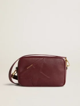 Star Bag de piel color vino con estrella tono sobre tono