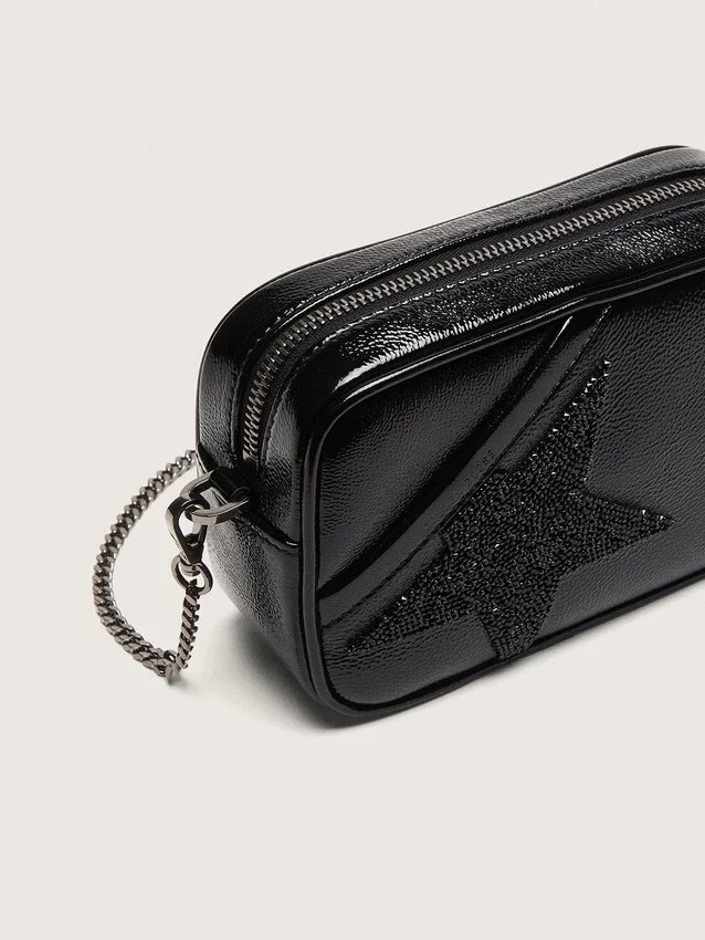 Star Bag de piel negra con estrella de cristal Swarovski