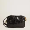 Star Bag en piel negra brillante con estrella tono sobre tono