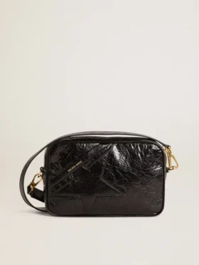Star Bag en piel negra brillante con estrella tono sobre tono