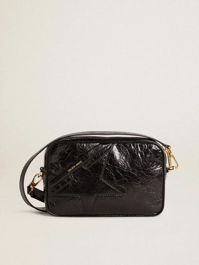 Star Bag en piel negra brillante con estrella tono sobre tono