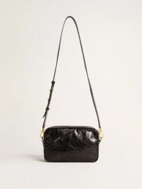 Star Bag en piel negra brillante con estrella tono sobre tono