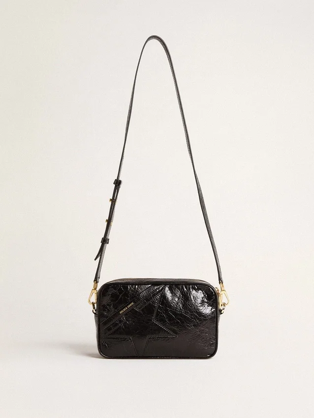 Star Bag en piel negra brillante con estrella tono sobre tono