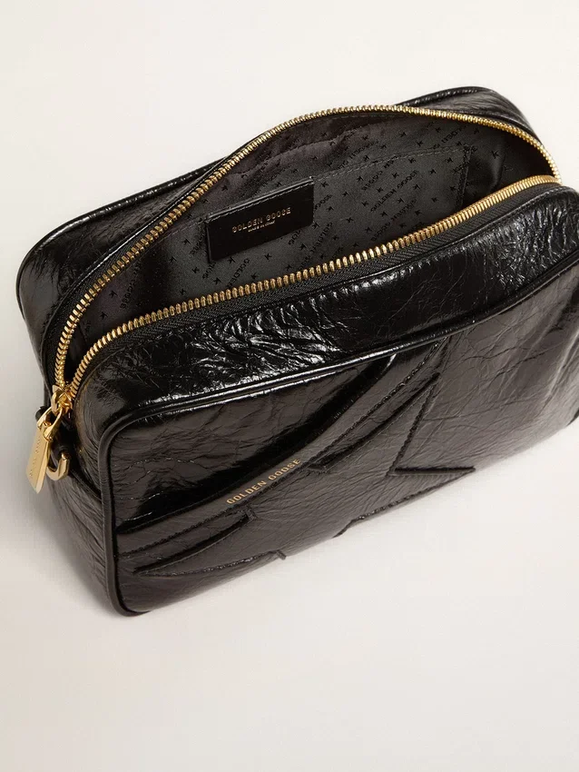 Star Bag en piel negra brillante con estrella tono sobre tono