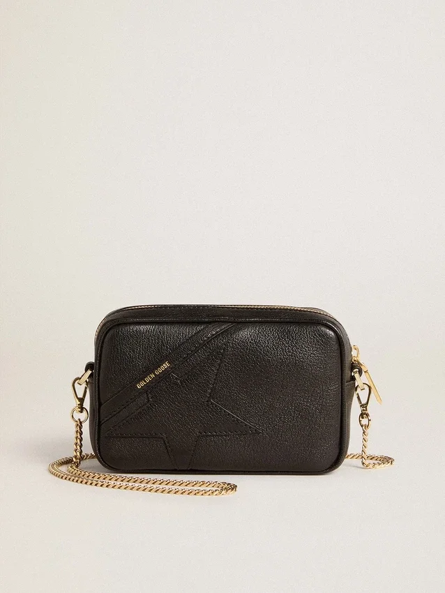 Star Bag Mini de piel negra con estrella tono sobre tono