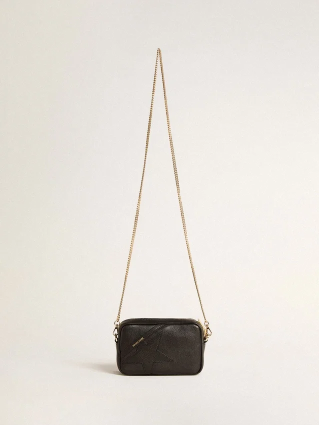 Star Bag Mini de piel negra con estrella tono sobre tono